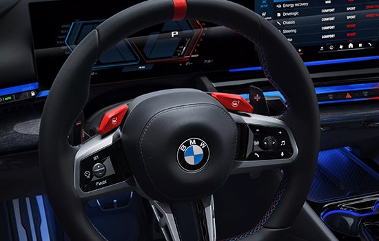 Close-up view of BMW M5 Touring steering wheel. | BMW of Lynnwood in Lynnwood WA